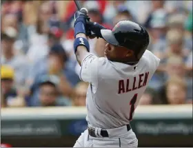  ?? JIM MONE — THE ASSOCIATED PRESS ?? Greg Allen hits a solo home run off Twins pitcher Jose Berrios during the first inning Aug. 11 in Minneapoli­s.