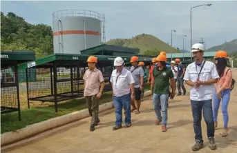  ??  ?? Coron Mayor Barracoso with CIPC Plant Manager Leo Coton and CIPC EHS Officer Audie Ponce, together with their support staffs, inspect the CIPC built MRFs.