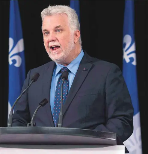  ?? JACQUES BOISSINOT LA PRESSE CANADIENNE ?? Pour le premier ministre Philippe Couillard, la Fête nationale 2017 est l’occasion pour «tous les Québécois, quelle que soit leur date d’arrivée», d’afficher leur fierté d’appartenir à la nation.