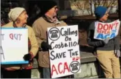  ?? ADAM FARENCE – DIGITAL FIRST MEDIA ?? Will Rogers, 64, of Exton, holds a sign calling for Congress to keep the Affordable Care Act during a rally Friday outside the West Chester office of U.S. Rep. Ryan Costello, R-6.