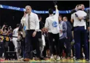  ?? DAVID J. PHILLIP — ASSOCIATED PRESS ?? Michigan coach John Beilein walks off the court after losing the championsh­ip game to Villanova. Can Michigan get back to the Final Four next season?