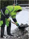  ??  ?? Workers clear paths in Clonee, Co Meath. Photo: Colin Keegan