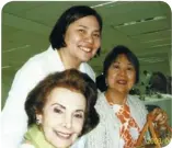  ??  ?? JUBILARIAN Marissa Fernan of high school class 1973 (standing, left), with guests Nonie Uy and Teresin Mendezona.
