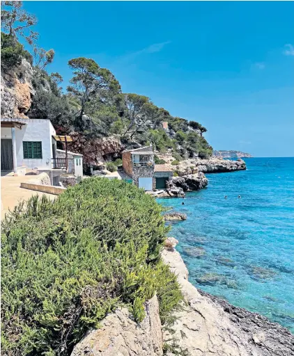  ?? ?? Balearic bliss: Santanyí is ‘almost too perfect’ yet the coast nearby is nearly deserted