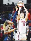  ?? ?? Washington Mystics forward Elena Delle Donne (11) shoots the ball against Indiana Fever guard Tiffany Mitchell (25) during the first half of an WNBA basketball game, Friday, May 6, 2022, in Washington. After two seasons in which she barely played, Washington Mystics star Elena Delle Donne is back – and still looking like one of the WNBA’s top players. (AP)