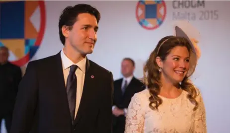  ?? MATT CARDY/GETTY IMAGES ?? Some journalist­s have criticized Prime Minister Justin Trudeau and his wife, Sophie Grégoire-Trudeau, for their appearance in Vogue magazine.