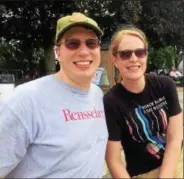  ??  ?? Nathan Gibson, left, and Lindsay O’Brien, right, hiked around Peebles Island State Park on Saturday before going to the nearby Waterford Steamboat Meet.