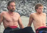  ??  ?? Chasing Mavericks stars Gerard Butler, left and Jonny Weston