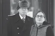  ?? ADRIAN WYLD / THE CANADIAN PRESS ?? Suspended Vice-Admiral Mark Norman and his lawyer Christine Mainville leave court in Ottawa Friday.