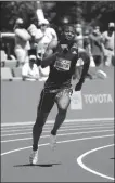  ?? USA TODAY SPORTS ?? The 17-year-old Erriyon Knighton, pictured in action on June 25, recently set two 200m youth world records, previously owned by Usain Bolt.