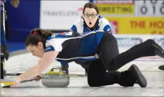  ?? The Canadian Press ?? Team Sweeting second Dana Ferguson slips and burns skip Val Sweeting’s first stone in the 10th end of their women’s tie-breaker against Team Einarson at the Home Hardware Canada Cup of Curling in Brandon, Man., on Saturday. Einarson defeated Sweeting...