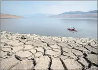  ?? ETHAN SWOPE — THE ASSOCIATED PRESS FILE ?? California is facing the worst drought in its recorded history, but there are better ways to solve the state water crisis than the More Water Now proposal. Above, drought-stricken Lake Oroville in August.