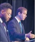  ?? BRAD HORRIGAN/HARTFORD COURANT ?? Hartford Mayor Luke Bronin, right, speaks at the mayoral primary debate in early September. Bronin won the Democratic nomination Sept. 10.