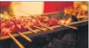  ??  ?? Scrumptiou­s kebabs on tandoor at the stall of Popo Grill