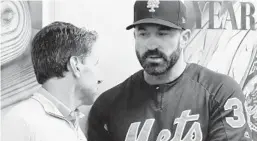  ?? ELSA/GETTY ?? Jeff Wilpon talks to embattled manager Mickey Callaway.