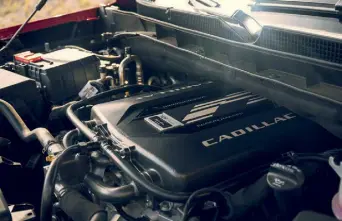  ?? ?? The supercharg­ed, 6.2-liter V-8 engine in the new Escalade V. (Cadillac)