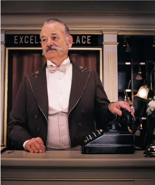  ??  ?? Bill Murray mans the desk at The Grand Budapest Hotel, where the clouds of war cast a heavy pall.