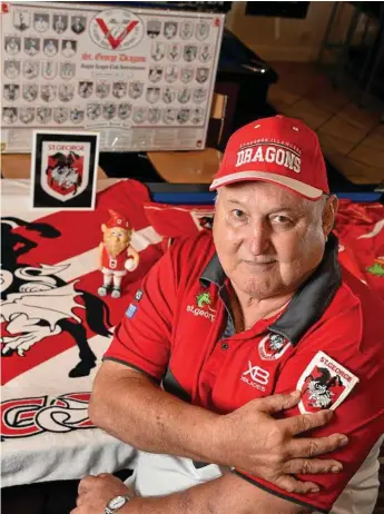  ?? Photo: Kevin Farmer ?? PROUD DRAGON: Preparing for the big NRL game in Toowoomba this weekend is St George Illawarra Dragons mega-fan and honorary life member Bill Mason.