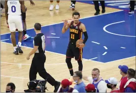  ?? MATT SLOCUM - THE ASSOCIATED PRESS ?? Atlanta Hawks’ Trae Young reacts after the Hawks won Game 7in a second-round NBA basketball playoff series against the Philadelph­ia 76ers, Sunday, June 20, 2021, in Philadelph­ia.