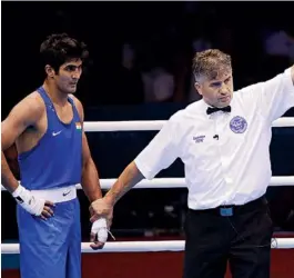  ??  ?? Vijender Singh ( left), 26, wants to fight