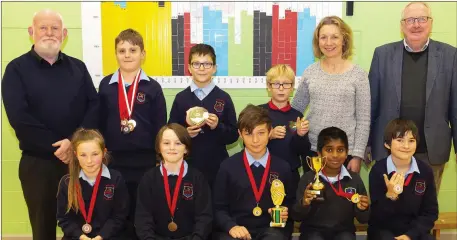  ??  ?? Wexford chess primary school individual winners with Brian MacMahon and Victor Furness, organisers and Michelle Quinlivan, teacher.