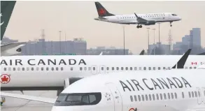  ?? CHRIS HELGREN / REUTERS FILES ?? The airline aid comes with limits on Air Canada's ability to pay dividends and executive compensati­on, conditions other countries have imposed as part of their rescue packages.