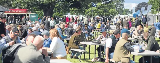  ?? Pictures: Kris Miller/Kim Cessford. ?? Crowds in the palace grounds at last year’s event.
