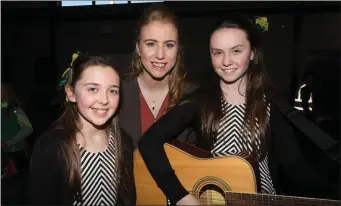  ??  ?? Taking part in the Scór na bPaistí county semi-finalsin The Hall at Presentati­on Secondary School, Castleisla­nd on Saturday l-r: Ava Fitzgerald, Amy Reidy (MC) and Aine Sheehy (Moyvane)