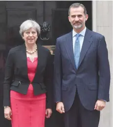  ?? — AFP ?? Britain’s Prime Minister Theresa May with Spanish King Felipe VI outside 10 Downing Street in London on Thursday.