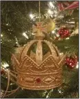  ?? Courtesy of Marni Jameson. ?? This crown ornament, which the author and her husband picked up on a trip to England’s Tower of London, forms the foundation for a tree that will evolve over years to reflect their newly blended family, travels and passions.