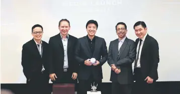  ??  ?? (From left) Fusionex vice president of marketing Chen Keat Ming, programme director James Martin,Teh, vice president of new technologi­es Raju Chellam, and vice president of solutions developmen­t James Houng during the launch of GIANT 2017.