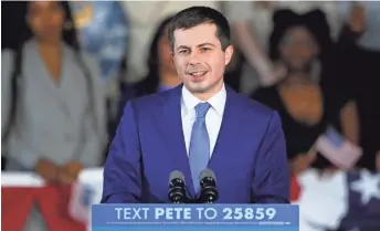  ?? CHARLIE NEIBERGAL/AP ?? Democratic candidate Pete Buttigieg speaks to Iowa supporters Feb. 3 in Des Moines.