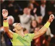  ?? Ryan Pierse / Getty Images ?? Rafael Nadal celebrates victory against Novak Djokovic during the quarterfin­als at the French Open on Tuesday.