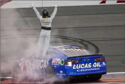  ?? JAE C. HONG — THE ASSOCIATED PRESS ?? Kyle Busch celebrates after winning a NASCAR race last week at Auto Club Speedway in Fontana, Calif.