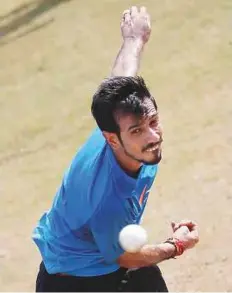  ?? Reuters ?? India’s Yuzvendra Chahal bowls during a nets session. Chahal rated David Warner as a greater threat than Aaron Finch.