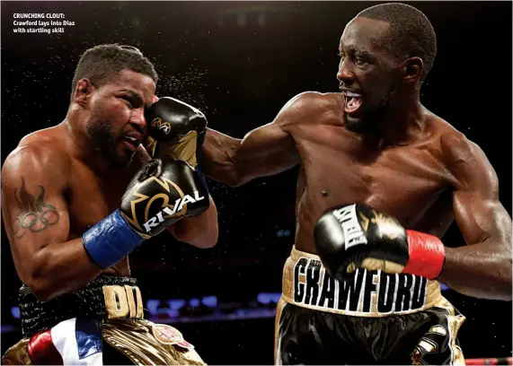  ?? Photos: MATT HEASLEY/MIKEY PHOTOS/TOP RANK ?? CRUNCHING CLOUT: Crawford lays into Diaz with startling skill