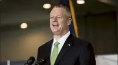  ?? Pool file photo ?? Gov. charlie baker, seen touring a vaccinatio­n site last week at the shaw’s center in brockton, came under fire from legislator­s again tuesday for his administra­tion’s handling of the vaccinatio­n effort.