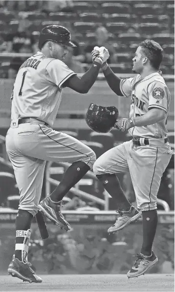  ?? JASEN VINLOVE, USA TODAY SPORTS ?? Shortstop Carlos Correa and second baseman Jose Altuve, right, helped the Astros compile an American League- best 60- 29 record in the first half. Both started the All- Star Game on Tuesday.