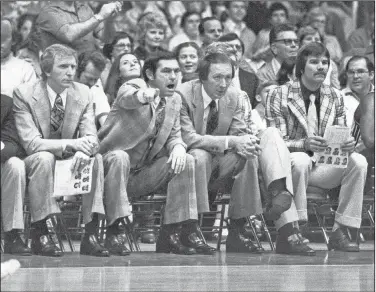  ?? (Democrat-Gazette file photo) ?? Arkansas basketball Coach Eddie Sutton watches his team during a Jan. 4, 1979, game. Sutton led Arkansas to a 260-75 record and nine NCAA Tournament appearance­s, including trips to the Final Four in 1978, Elite Eight in 1979, and Sweet 16 in 1981 and 1983.