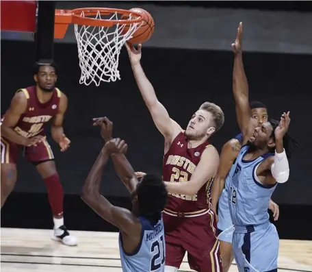  ?? AP ?? GOING UP STRONG: BC’s Rich Kelly goes up for a layup during the Eagles’ win over Rhode Island last night.