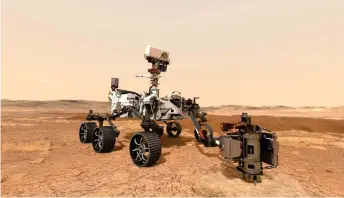  ?? — AFP file photo ?? This file hows Nasa’s Mars 2020 rover as it uses its drill to core a rock sample on Mars.