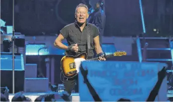  ?? CHRIS O'MEARA/AP ?? Bruce Springstee­n and the E Street Band perform on Feb. 1 in Tampa, Florida.