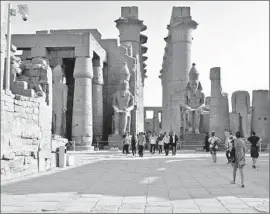  ?? European Pressphoto Agency ?? TOURISTS VISIT the Luxor Temple in Egypt. The nearby Karnak Temple was attacked. Some reports said five people were injured, including two police officers.