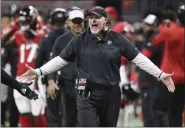  ?? CURTIS COMPTON - THE ASSOCIATED PRESS ?? Falcons head coach Dan Quinn speaks to players during the first half of last Sunday’s 24-12 win over the Jaguars in Atlanta last Sunday.