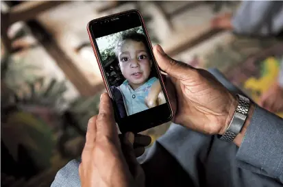  ??  ?? A picture of 4-year-old Mohammad Ayan Ali, who was killed after a device that looked like a toy exploded in his hands in the village of Jabri, Kashmir. — Reuters