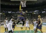  ?? ELISE AMENDOLA — THE ASSOCIATED PRESS ?? Cleveland Cavaliers forward LeBron James dunks in the first half of Game 2 of the Eastern Conference finals against the Boston Celtics on Friday.