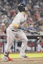  ?? Christian Petersen / Getty Images ?? Mitch Moreland’s solo homer against the Diamondbac­ks salvaged the final game of Boston’s awful opening trip. Associated Press