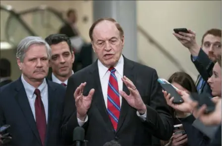  ?? J. SCOTT APPLEWHITE — THE ASSOCIATED PRESS ?? From left, Sen. John Hoeven, R-N.D., Rep. Tom Graves, R-Ga., and Sen. Richard Shelby, R-Ala., the top Republican on the bipartisan group bargainers working to craft a border security compromise in hope of avoiding another government shutdown, speak with reporters after a briefing with officials about the US-Mexico border, on Capitol Hill in Washington, Wednesday.