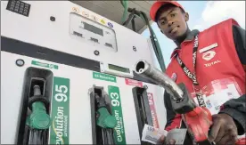  ?? PHOTO: SIMPHIWE MBOKAZI/AFRICAN NEWS AGENCY (ANA) ?? An attendant at a petrol station. The present fuel levy could disappear in the span of the next 10 years, says a University of Stellenbos­ch logistics expert.
