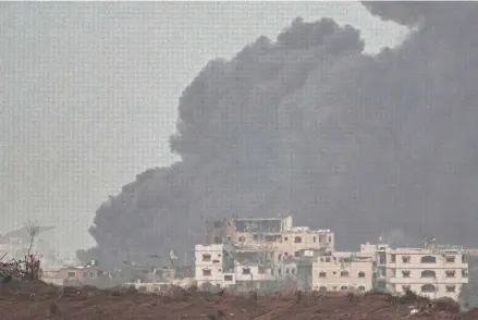  ?? LEO CORREA/AP ?? Smoke rises into the sky after an explosion in the Gaza Strip as seen from southern Israel on Saturday.